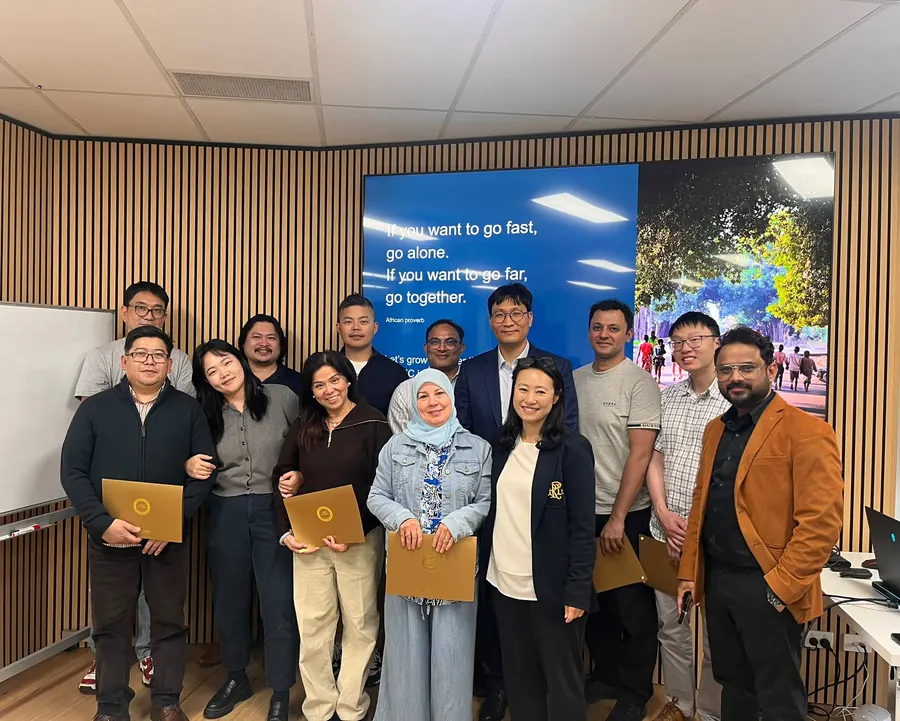 Dr JohnPaul with the dentists who completed the hands-on implant seminar, several holding their certificates